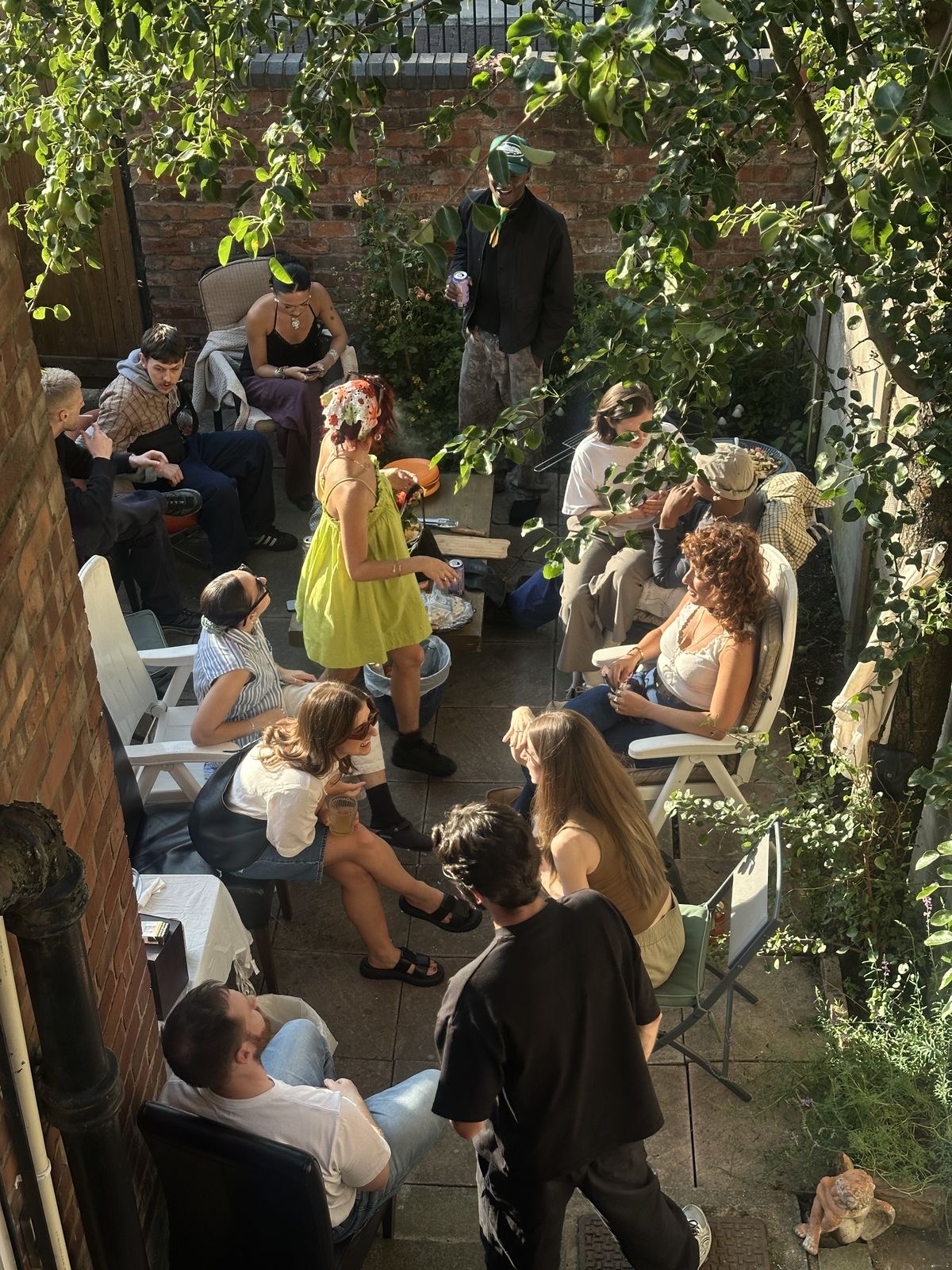 Pods Offline community at a recurring supper club in a London backyard, the kind of small, in-person gathering Pods is built for